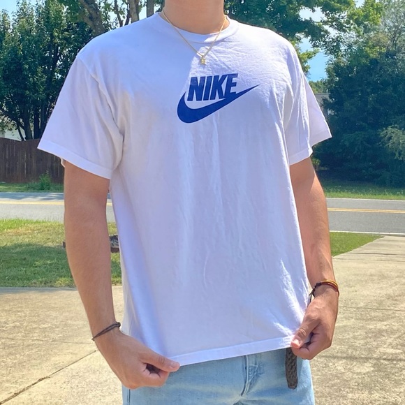 blue and white nike shirt